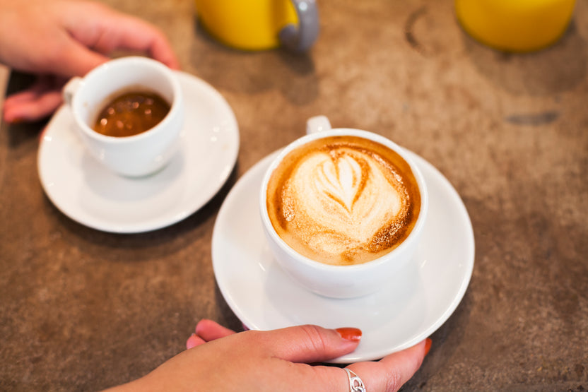 Woman holding a cup of coffee